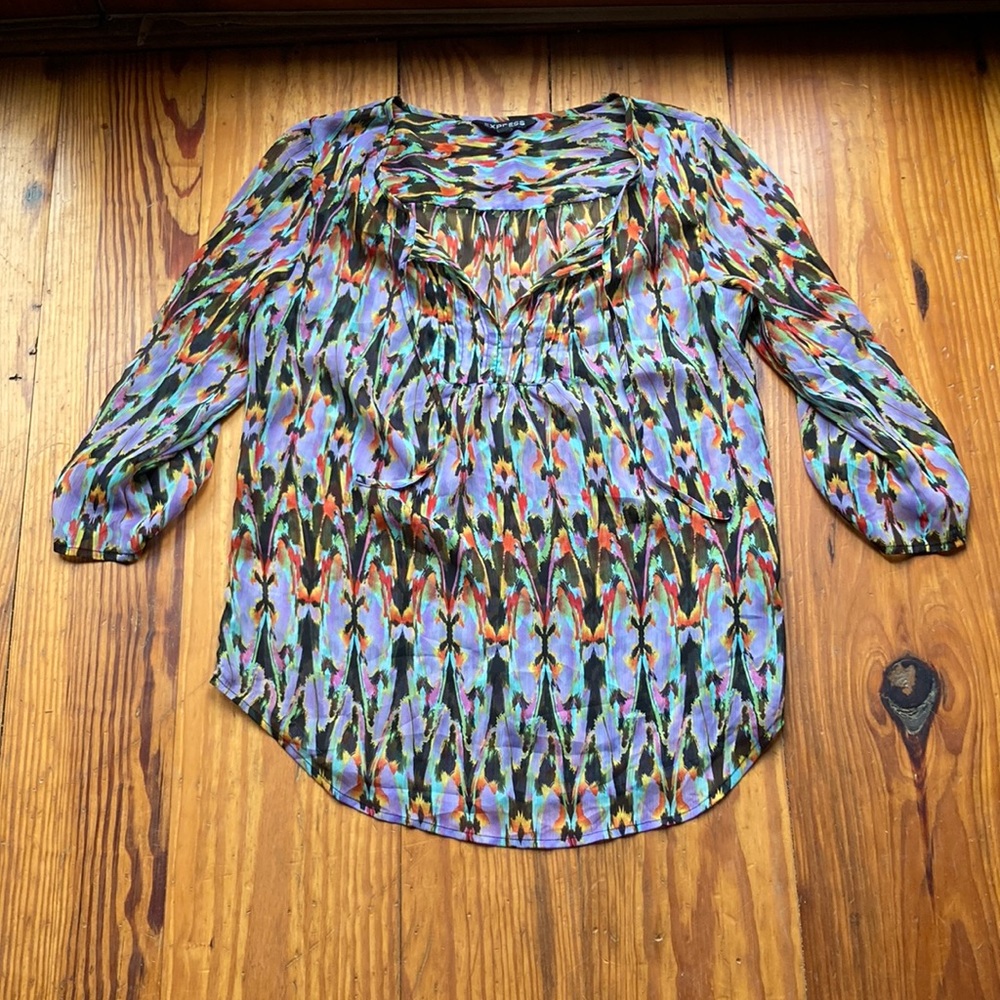 Express multi colored sheer top with pulls shown in picture Sz. S